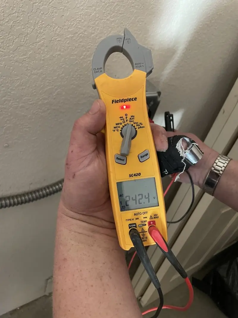 Voltage testing with clamp meter during Ceiling Fan Installation in Murrells Inlet